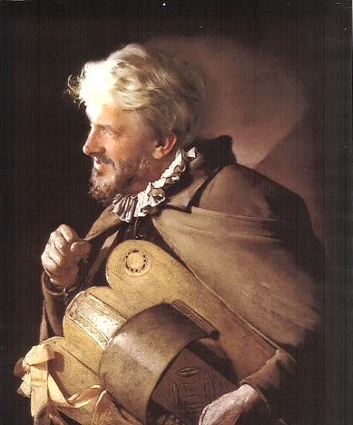 Portret mężczyzny z zegarem w ręku.