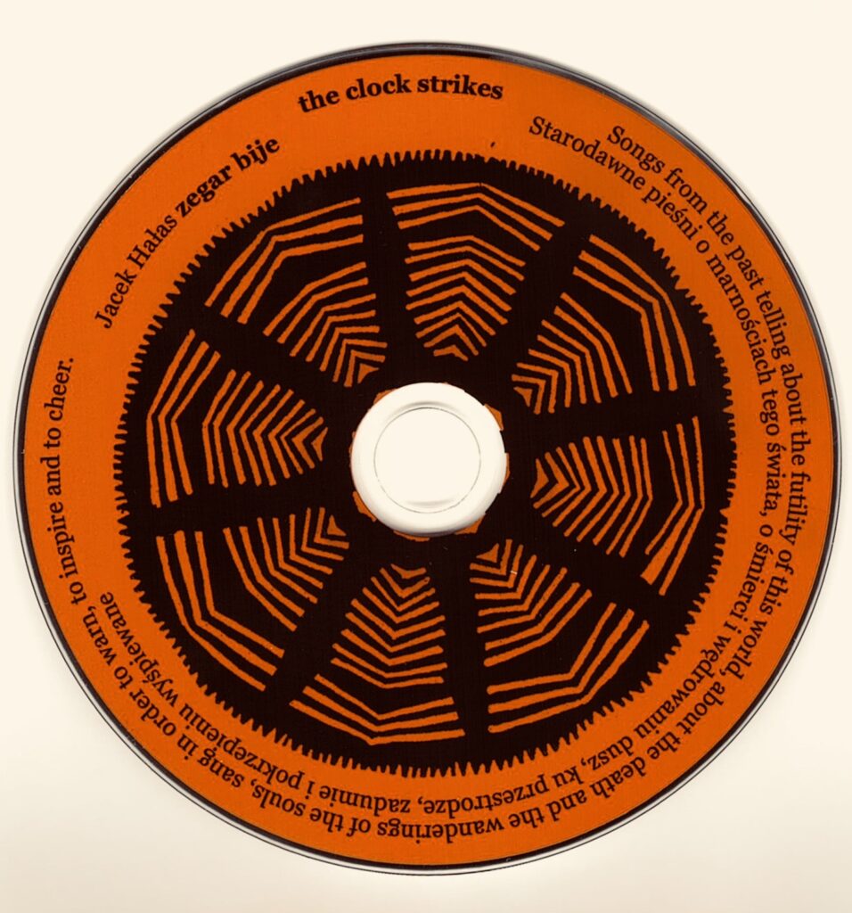 CD z grafiką i tytułem 'the clock strikes'